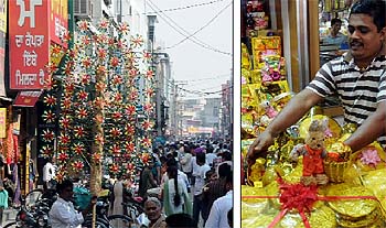A view of the Dhobi Bazaar that is witnessing a great rush of shoppers for Divali; a trader makes a sales pitch for his gift packets; students of St. Kabir Senior Secondary School take part in diya (earthen lamp) making competition; a child donning sunglasses beams with joy as he returns home after buying the toy of his choice, a wind wheel (charkhi)