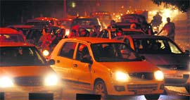 A traffic jam on the road separating Sector 19 and 20 in Chandigarh on Sunday.
