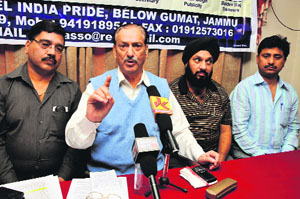 Members of the Hotels and Lodges Association address mediapersons in Jammu on Sunday.