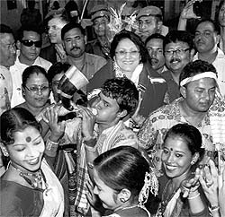 Union Minister of State for Tribal Affairs Ranee Narah is greeted by her supporters and party workers during her first visit to Assam after becoming a minister in Guwahati on Sunday