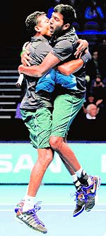 Mahesh Bhupathi and Rohan Bopanna celebrate their win in London on Sunday