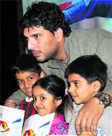 Yuvraj Singh with his young fans