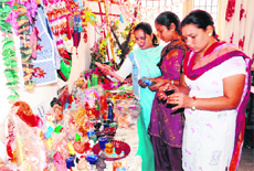 Women take a look at artifacts made by Pingalwara inmates in Amritsar. photo: Vishal Kumar