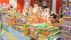 A cracker seller at his stall in the sports stadium, one of the designated sites for the sale, in Bathinda. Photo: Bhupinder Dhillon