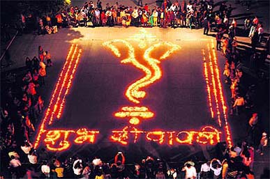 Diyas make an impressive display as Chandigarh residents gather at the Sector 17 plaza on Monday
