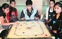 A game in progress during the Raj Kumar Babuta Memorial Prize Money Carrom Ranking Tournament in chandigarh on Monday