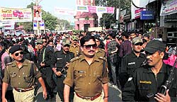 Dehradun SSP Kewal Khurana oversees security arrangements at Paltan Bazaar in Dehradun on Monday
