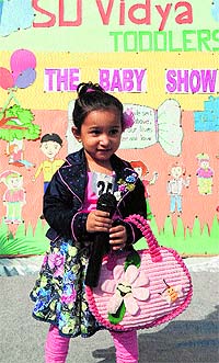 A child performs at a baby show at SD Vidya Toddlers School, Ambala Cantt