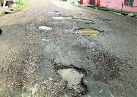 Road at the Jwalamukhi bus stand in a bad shape.