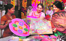 Residents purchase rangoli designs on the eve of Divali in Ludhiana.