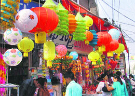Paper and cloth lanterns on display.