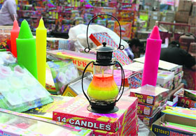 Designer candles on sale in markets on the eve of Divali in Ludhiana.
