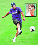 Sachin Tendulkar plays with a soccer ball during a cricket practice session in Ahmedabad. JAMES ANDERSON (inset)  Reuters