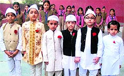tudents dressed as Pandit Jawaharlal Nehru celebrate Children's Day at Ryan International School in Amritsar