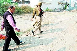 Mayor Bakshi Ram Arora inspects the stretch which would be transformed into a smooth road parallel to Lawrence Road in Amritsar on Wednesday