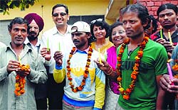 Indian fishermen celebrate Divali with members of the Akhil Bhartiya Human Rights organisation in Amritsar