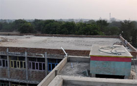 A private primary school located right near the Lasara drain and the distillery.