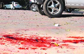 Blood on the road where SOPU leader Amarinder Singh was attacked