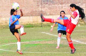 A match in progress during a soccer tournament in Chandigarh on Wednesday
