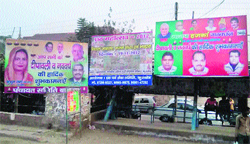 Hoardings at a bus queue shelter on Agrasain Marg, Kurukshetra. Tribune photo