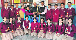 The winning team of Green Field Senior Secondary School, Nagrota Bagwan, with their trophy.