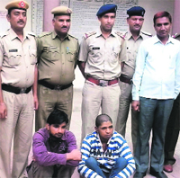 Sunil and Surender in police custody at Tohana in Fatehabad on Wednesday.