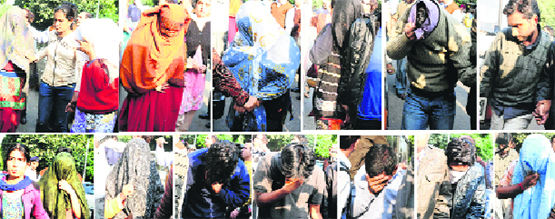 The accused in the PGI MD entrance examination racket being produced in the District Courts in Sector 17, Chandigarh, on Thursday. Tribune photo: Parvesh Chauhan