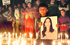 Monikas son Krish and members of her family take out a candlelight march in Chandigarh on Thursday. a tribune photograph