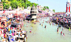 People throng Har-ki-Pauri at Haridwar after the authorities allowed the flow of the Ganga after a gap of 15 days. The step was taken for 