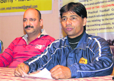 Virendra Singh Rawat (right), secretary of the Dehradun Football Academy, addresses mediapersons on Thursday. 