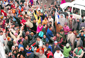 Pilgrims to Vaoshno Devi Shrine wait for buses at Katra.