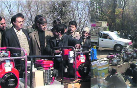 Visitors have a look at prototypes of power generators at Farm Machinery Mela in Shopian on Thursday.