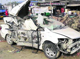 The mangled remains of the car that met with an accident near Jagraon on Wednesday night.