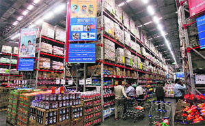 Customers shop at a Best Price Modern Wholesale store, a joint venture of Wal-Mart Stores and Bharti Enterprises, in Zirakpur. The enforcement directorate is investigating allegations Wal-Mart violated foreign exchange laws when it invested US $100 million in a domestic unit owned by its JV partner, a senior ED official told Reuters on Friday
