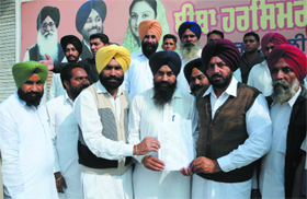 National general secretary of the Youth Akali Dal Jagir Singh Kalyan and district president Balkar Singh Sidhu releasing the list of office-bearers of the Nathana circle of the youth wing of the Shiromani Akali Dal (SAD) in Bathinda on Friday. 