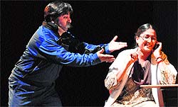 Artistes stage a play at the Tagore Theatre in Chandigarh on Friday