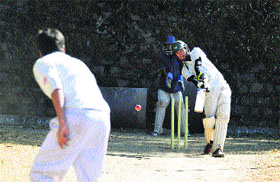 Players in action during T20 cricket trials at the Summer Hill ground in Shimla on Friday.