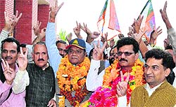 BJP candidates Uttam Singh and Rashpal Verma after filing the nomination papers in Jammu on Friday