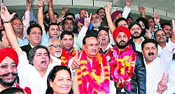 Ved Mahajan and Gurmeet Singh Bajwa of the PDP outside the Divisional Commissioners office after filling nomination papers in Jammu on Friday