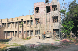 An under-construction building on Jammu University campus. Tribune photo: Inderjeet Singh