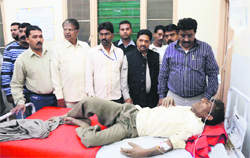 MC sewer man Shiv Kumar undergoes treatment at the Civil Hospital in Ludhiana on Friday. A Tribune photograph