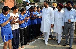 Chief guest Malkit Singh Gill Balluana meets the kabaddi players before a match at Government Girls Senior Secondary School