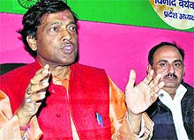 Vinod Barthwal, former president of the state unit of the Samajwadi Party, addresses a press conference in Dehradun on Saturday