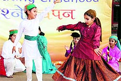 Children perform a dance
