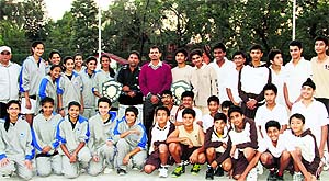 The winners of the District Basketball Sub-Junior (15 years) Championship in Dehradun on Saturday
