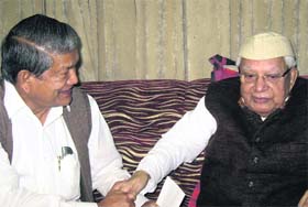 Union minister Harish Rawat meets former Chief Minister ND Tiwari in Dehradun on Saturday