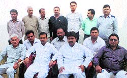 Disgruntled municipal commissioners at Congress leader Rajbir Dahiyas (sitting on the left chair) office in Gohana on Friday
