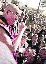 The Dalai Lama greets students of the Tibetan Childrens Villages after the special International Tibet Support Groups Meeting at McLeodganj on Saturday