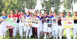 Students of St. Soldier Group of Institutions, Jalandhar, show posters made by them to welcome Sunita Williams and her team on their return from space after four months. A Tribune Photograph