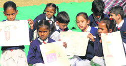 Children from slums take part in a painting competition at the Gymkhana Club in Jalandhar on Saturday. Photo: sarabjit Singh